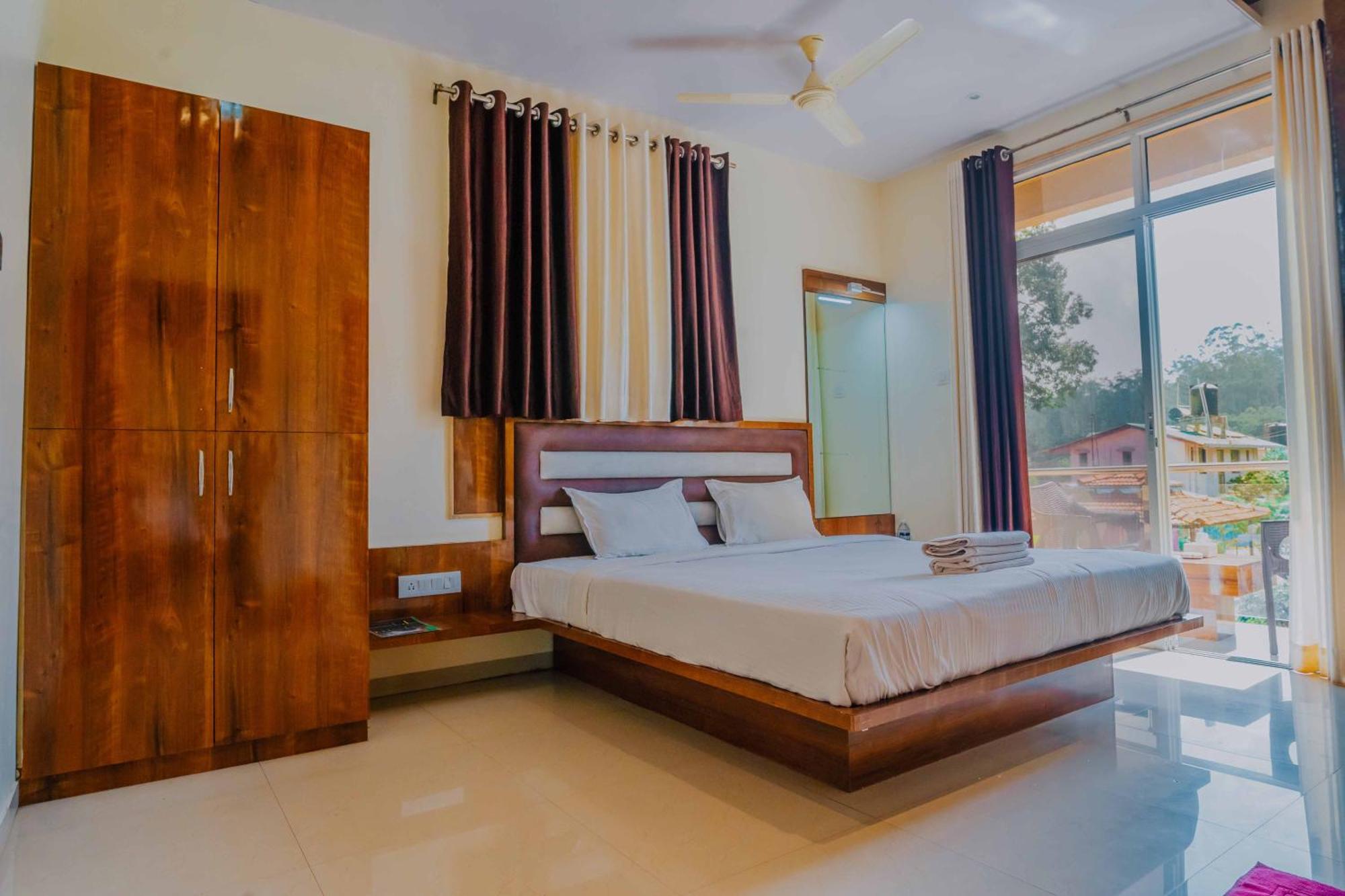 Hotel Oakwood Махабалешвар Номер фото